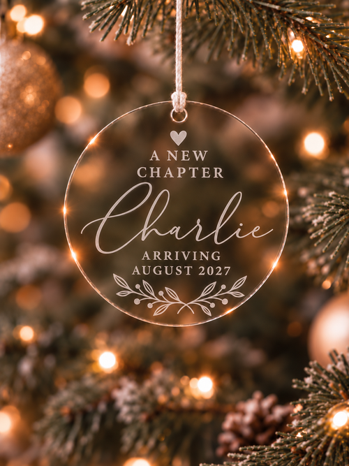 Personalised baby announcement ornament with A New Chapter wording, baby name and expected arrival date