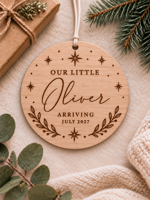 Personalised baby announcement ornament with Our Little wording, baby name, stars and botanical wreath