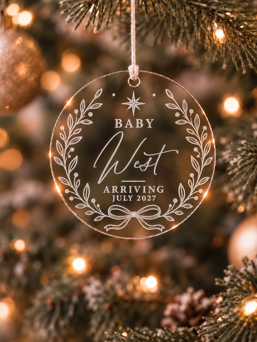 Pregnancy announcement Christmas ornament with personalised baby name, leafy wreath and bow