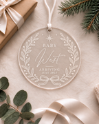 Baby announcement ornament personalised with name and arrival month and year in a botanical bow design